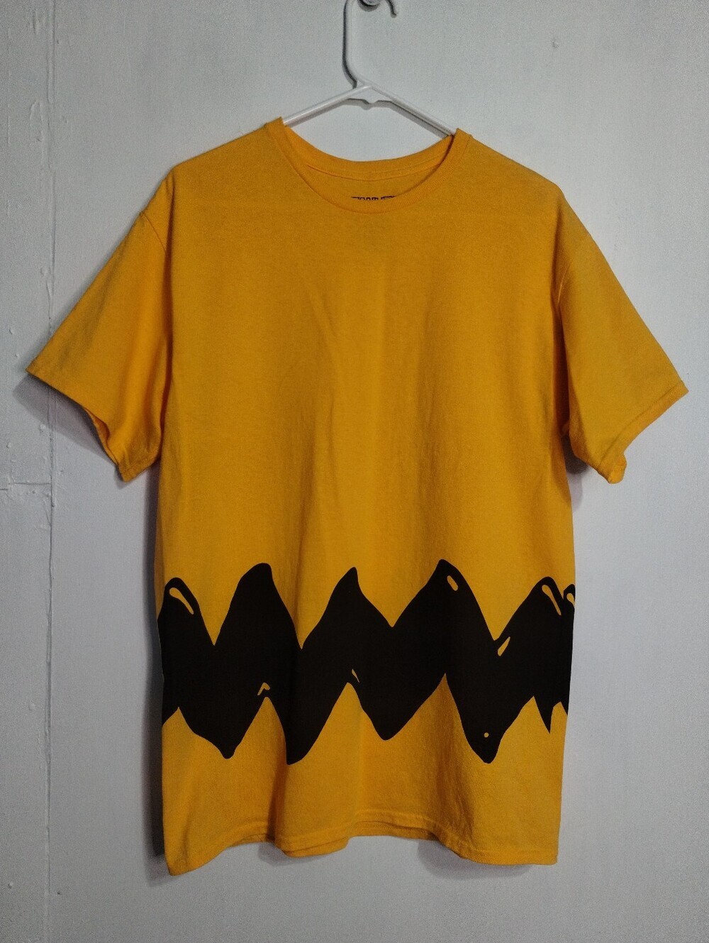 Peanuts Charlie Brown Yellow Short Sleeve Tee with Black Zigzag Hem
